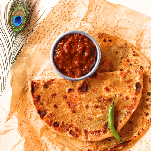 Schezwan Paneer Paratha (2 pcs)